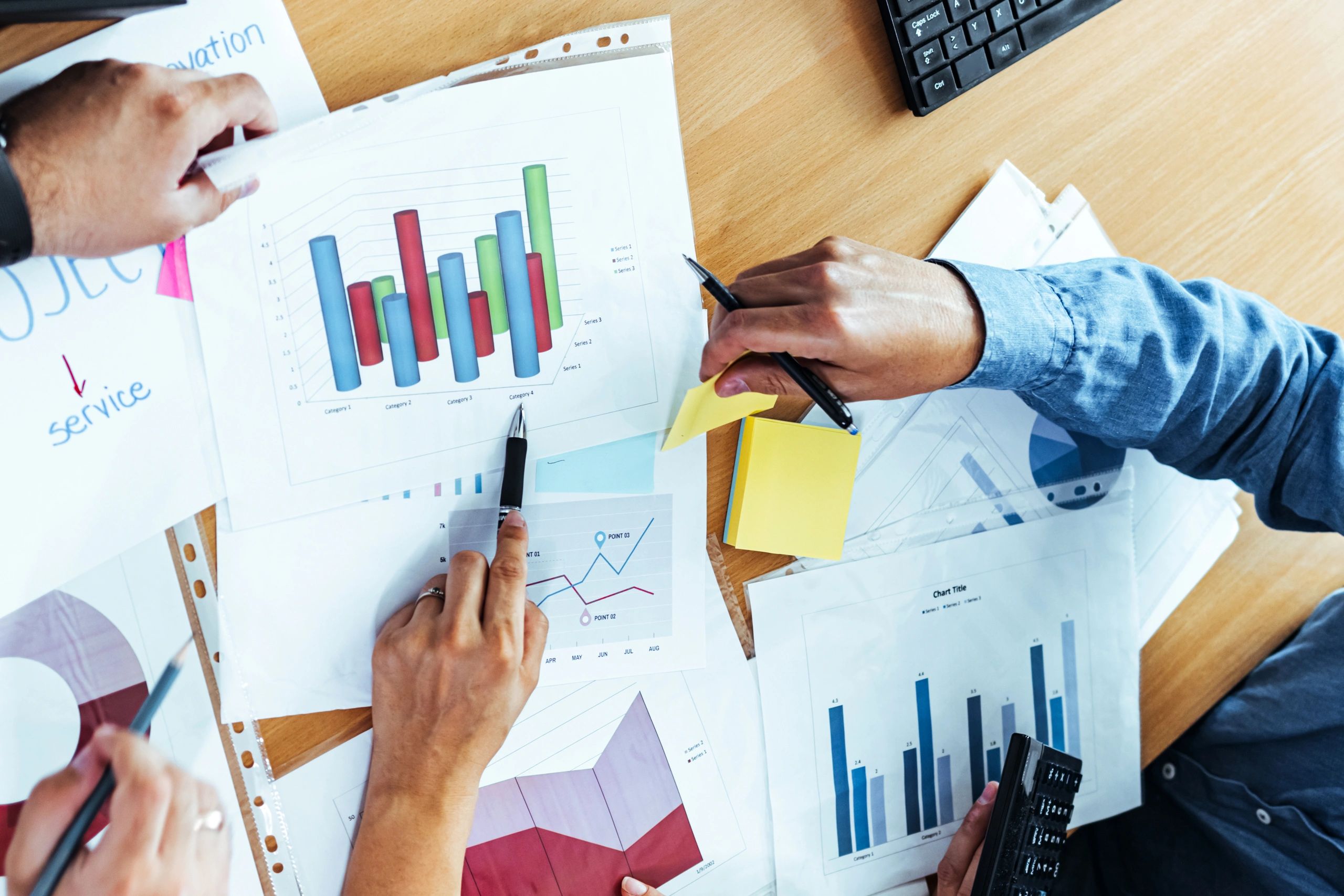 Finance professionals discussing loan pipeline strategy in an office