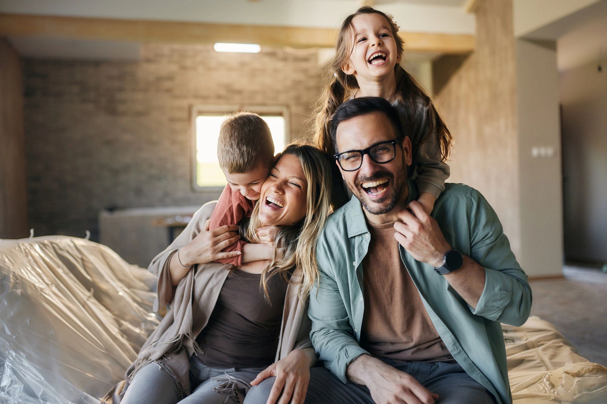 Family enjoying time together in a new home