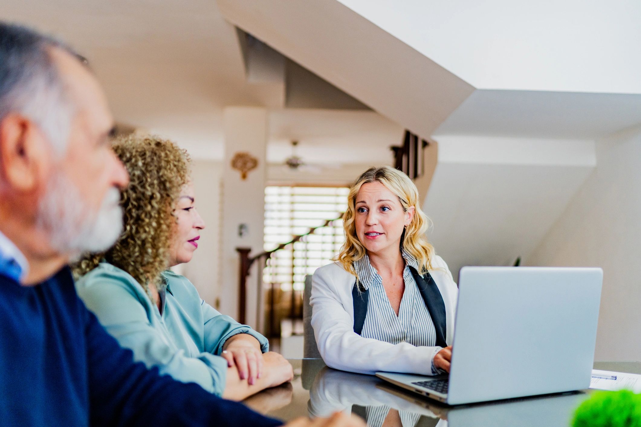 Financial advisor meeting with clients