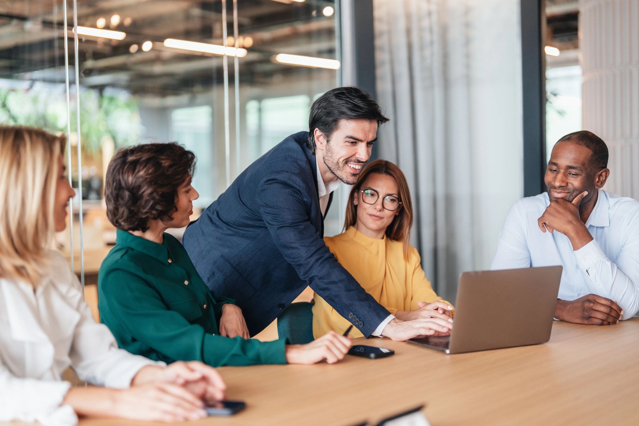 Modern business meeting focused on finance planning and team collaboration